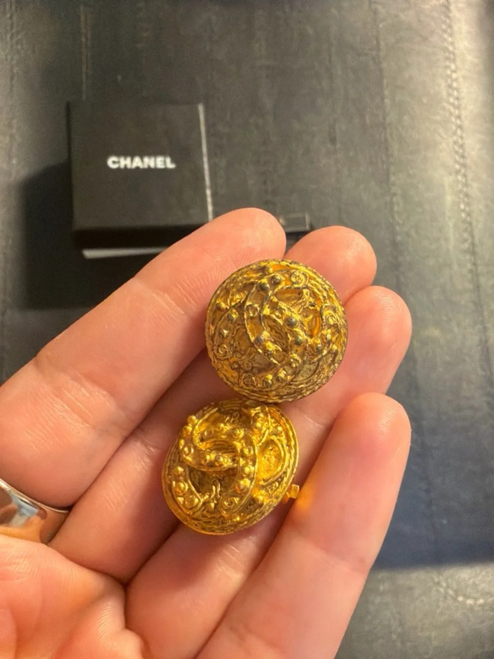 CHANEL Gold Tone Embossed Logo Cuff Links